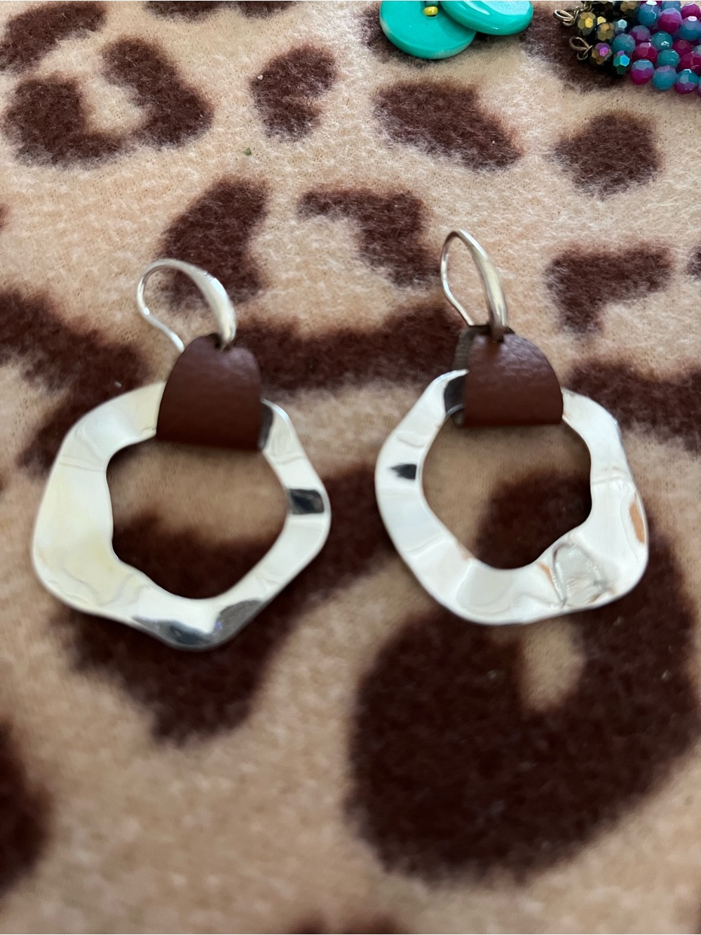Hammered Silver Hoop Earrings with Brown Leather Accent